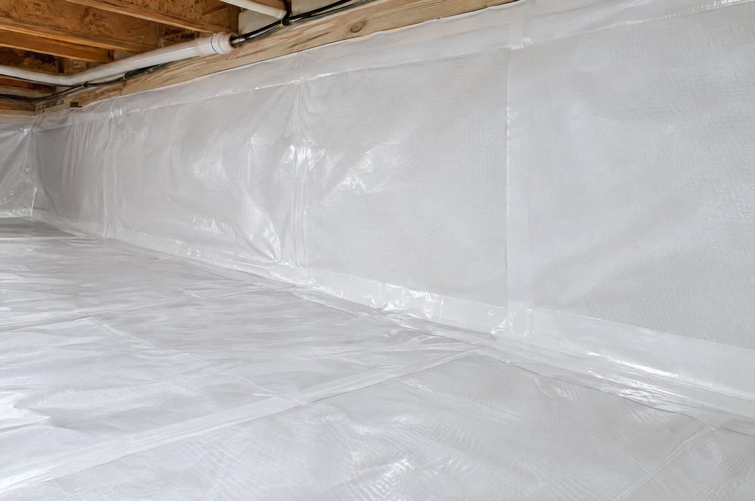 Crawl space encapsulation with vapor barrier and dehumidifier in a Charlotte home