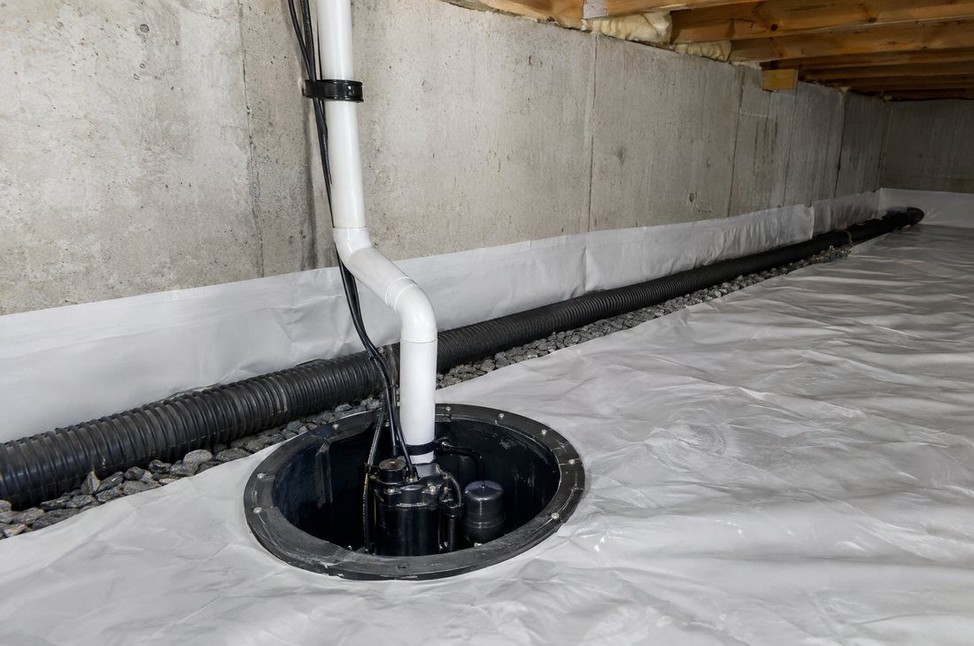 Crawl space waterproofing with interior drainage and a sump pump in Charlotte